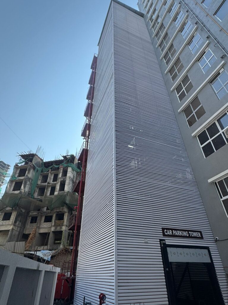 Close-up detail of horizontal diamond Upvc Fin louvers from the parking tower stairwell, Sainath Residency Bhandup