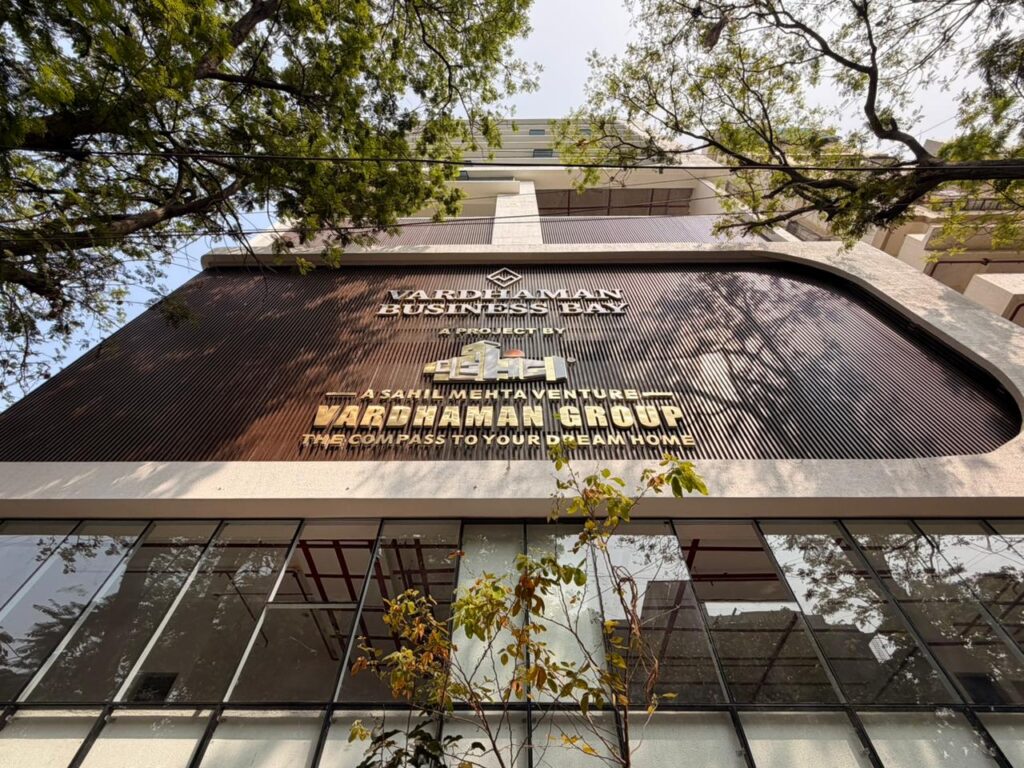Vardhaman Business Bay entrance signage set against dark brown Upvc fin backdrop, Ghatkopar