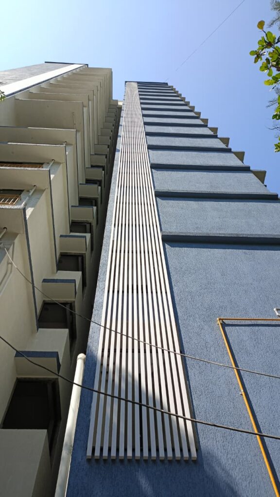 Full elevation view of the white Upvc fin duct run, Bhaveshawar Heights, Dahisar